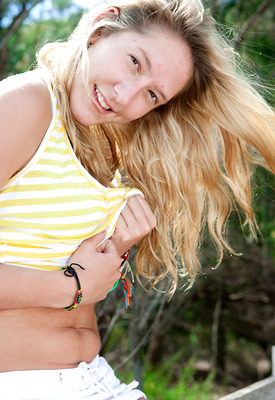 Nina Strips Outdoors by Abby Winters