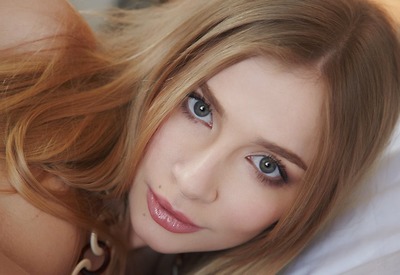 Sexy Raffaella Plays Naked On The Bed And Spreads Her Pussy by Errotica Archives