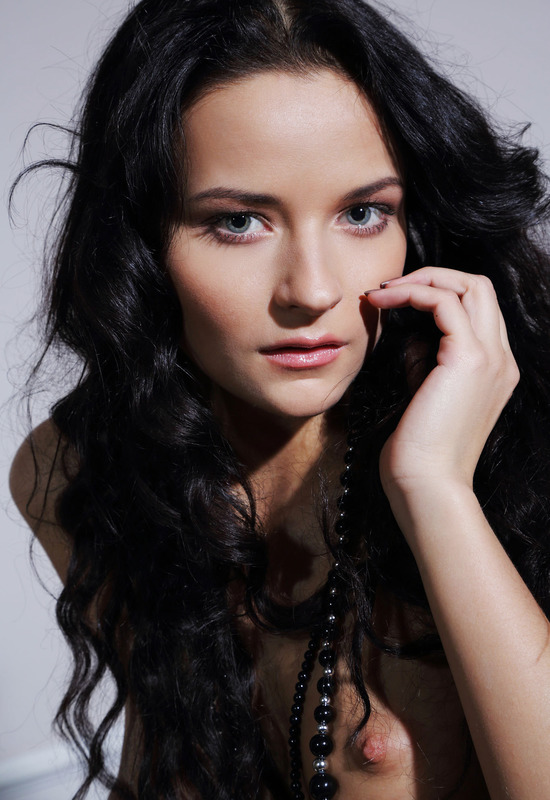 Seductive Babe Ardelia A Posing in Stockings in Bedroom by Errotica Archives