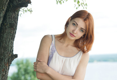 Calida from Femjoy posing naked outdoors in nature