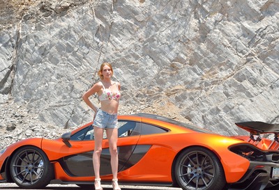 Cute Slender Teen Anya Posing On Road Next To Sports Car by FTV Girls - 3 of 16